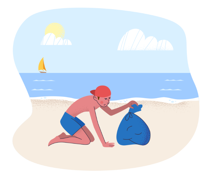 Boy on a beach with a bag of garbage